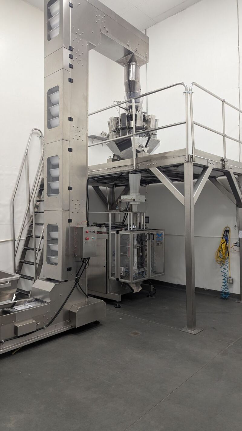 Vertical form-fill-seal pouch line